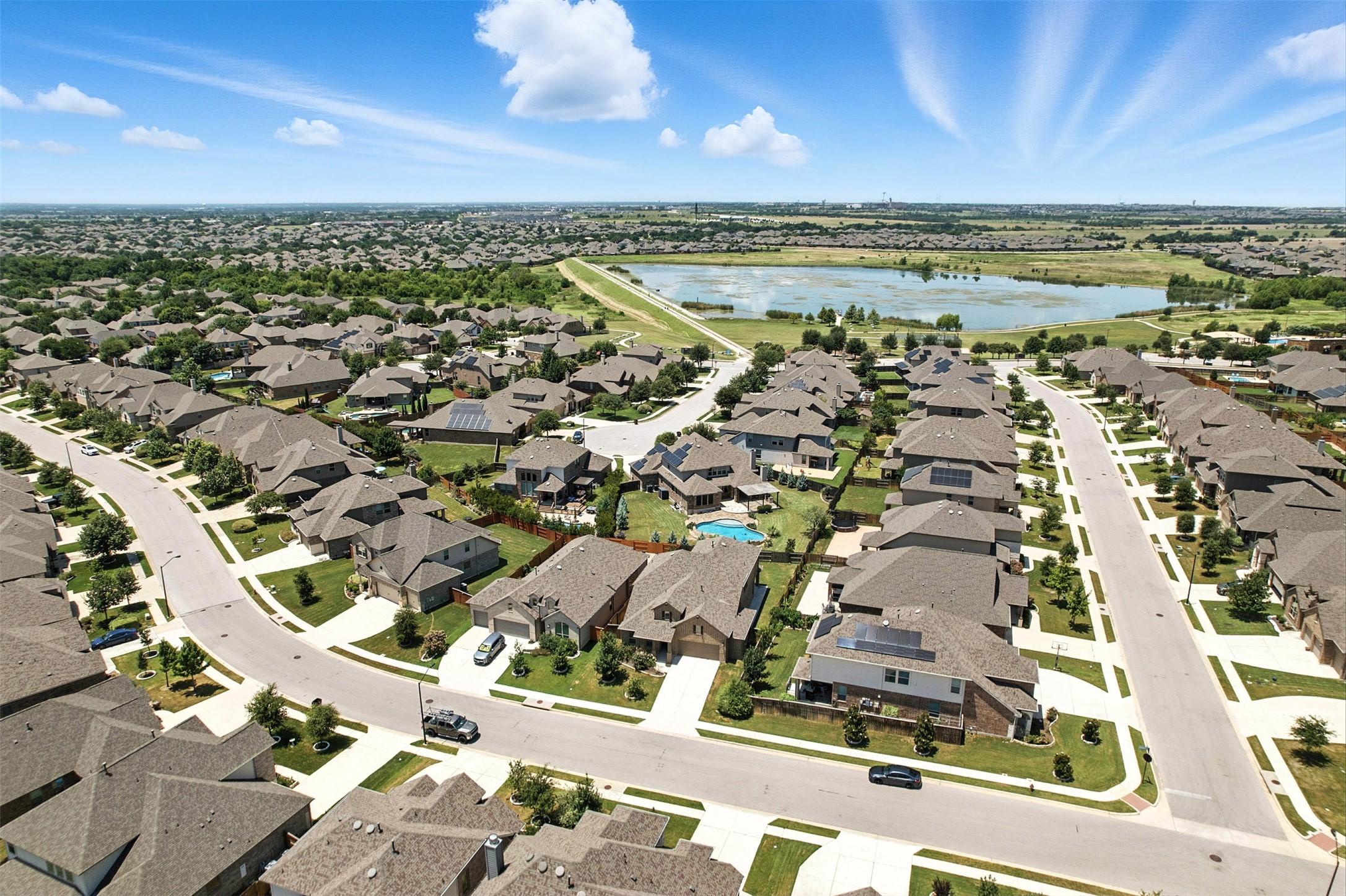 3054 Columbus Loop Round Rock, TX 78665 - Photo 30 of 40 Aerial view of property's location featuring nearby suburban area and a large body of water