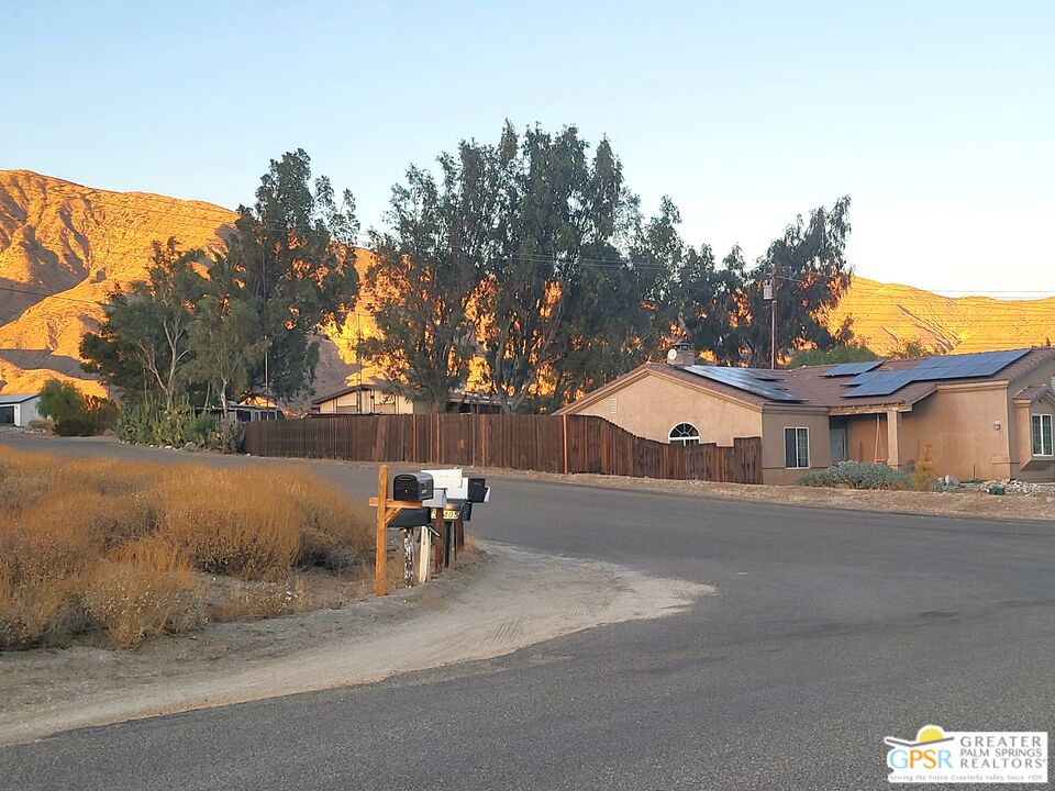 0 Kindale Drive Whitewater, CA 92282 - Photo 16 of 21 a view of a house with a yard and a tree
