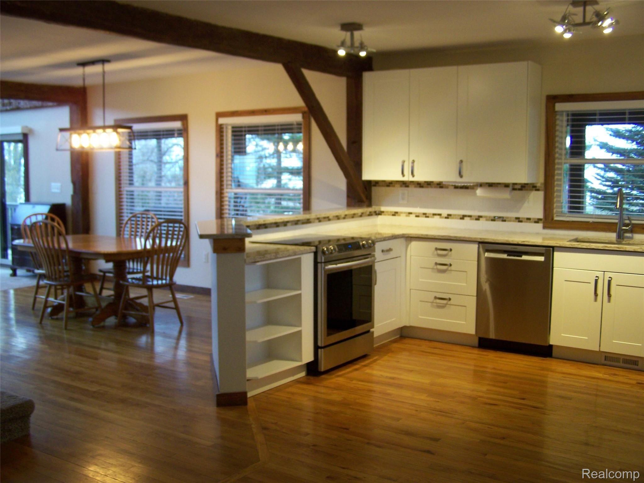 3325 Pointe Aux Barques Road Port Austin, MI 48467 - Photo 21 of 42 Kitchen to Dining1.JPG