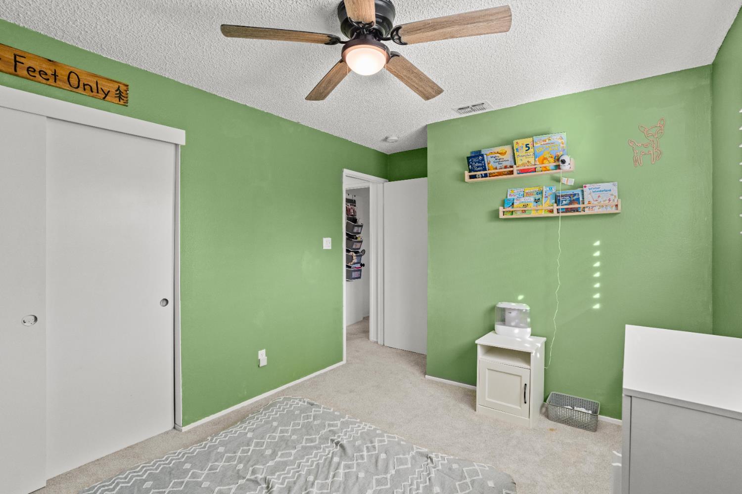 3412 Huntsman Drive Sacramento, CA 95826 - Photo 22 of 32 a bathroom with a toilet sink and mirror