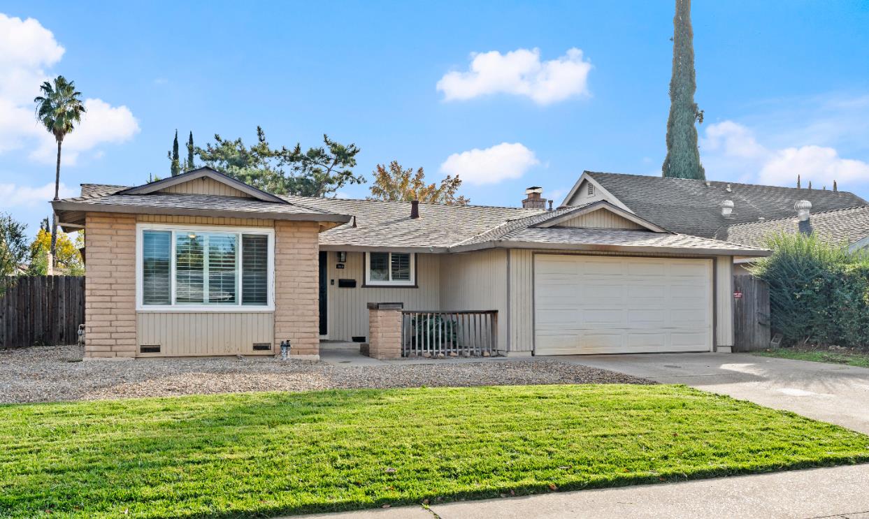 3412 Huntsman Drive Sacramento, CA 95826 - Photo 26 of 32 a front view of a house with garden