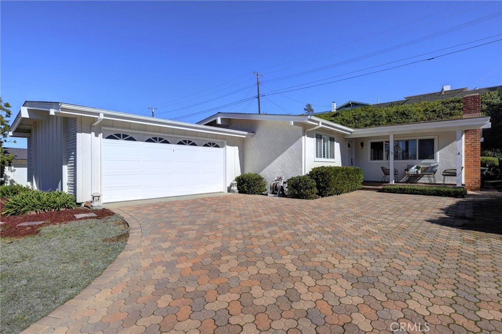 27054 Springcreek Road Rancho Palos Verdes, CA 90275 - Photo 1 of 1 a front view of a house with garden
