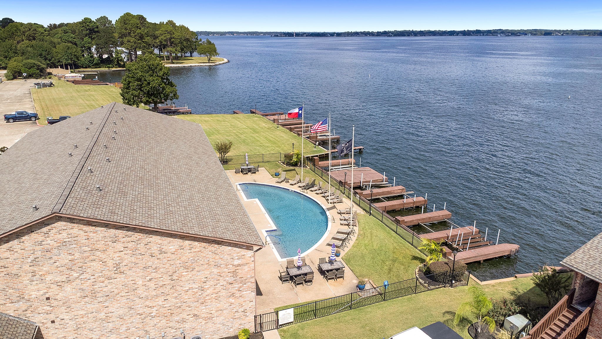 an aerial view of a house with outdoor space
