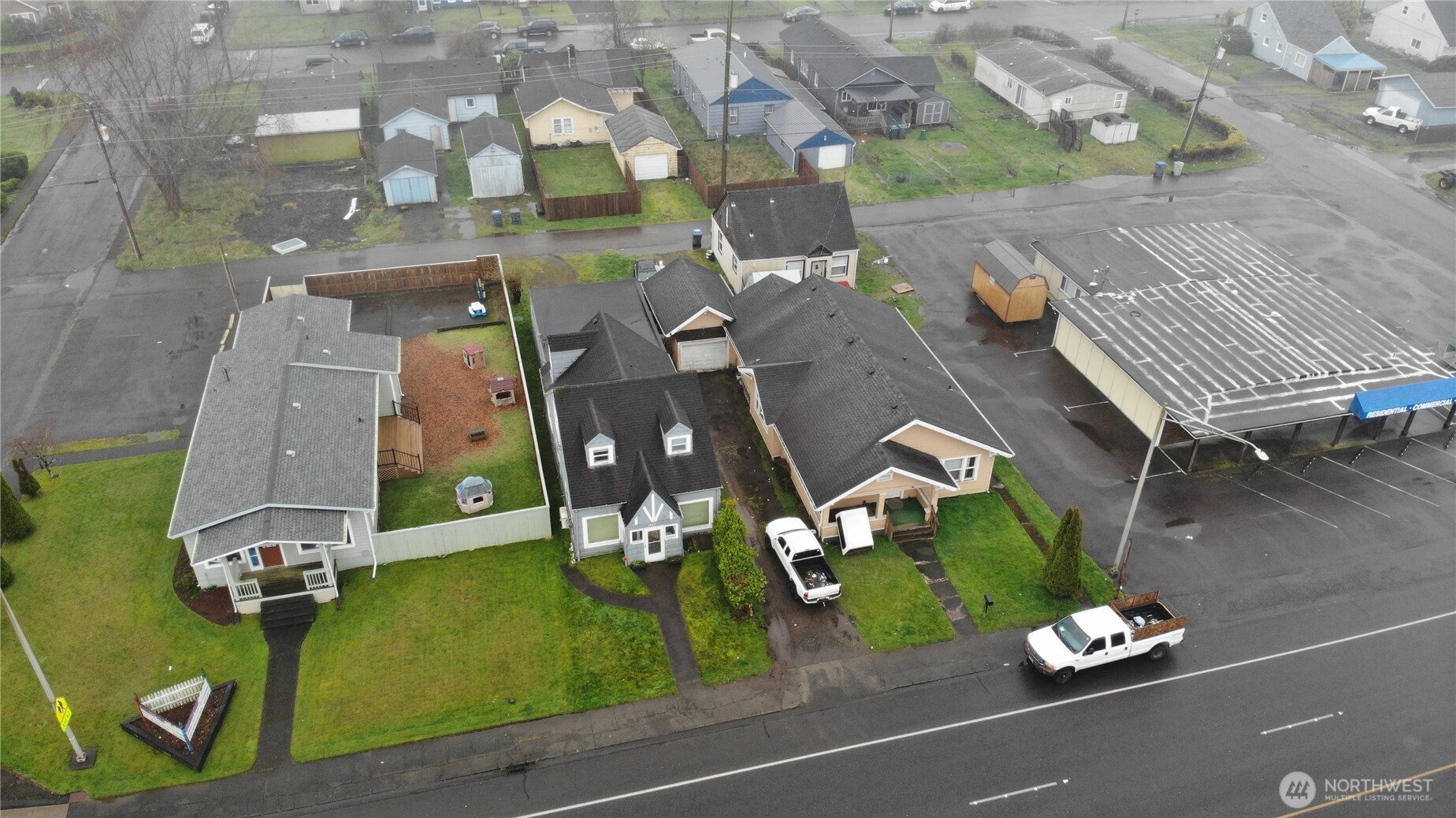 1907 Simpson Avenue Aberdeen, WA 98520 - Photo 16 of 17 an aerial view of a house with garden space and street view