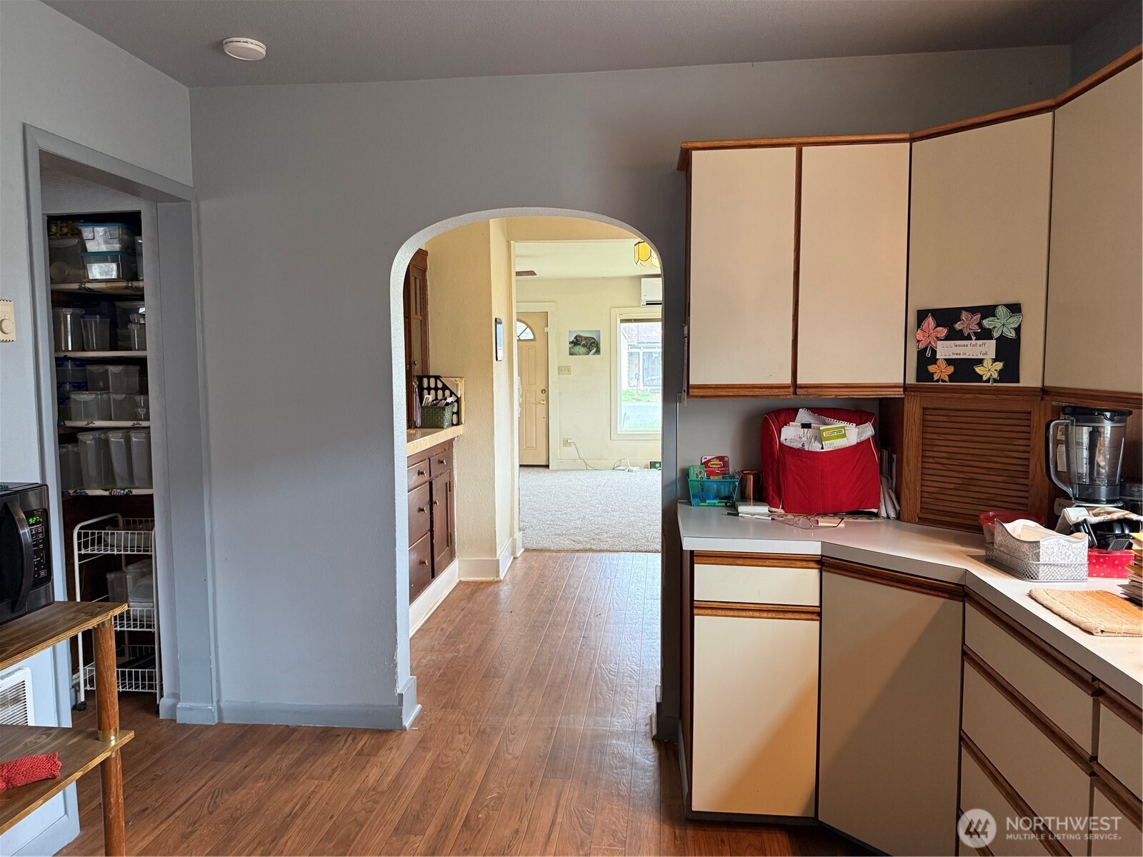 1907 Simpson Avenue Aberdeen, WA 98520 - Photo 8 of 17 a kitchen with a refrigerator and cabinets