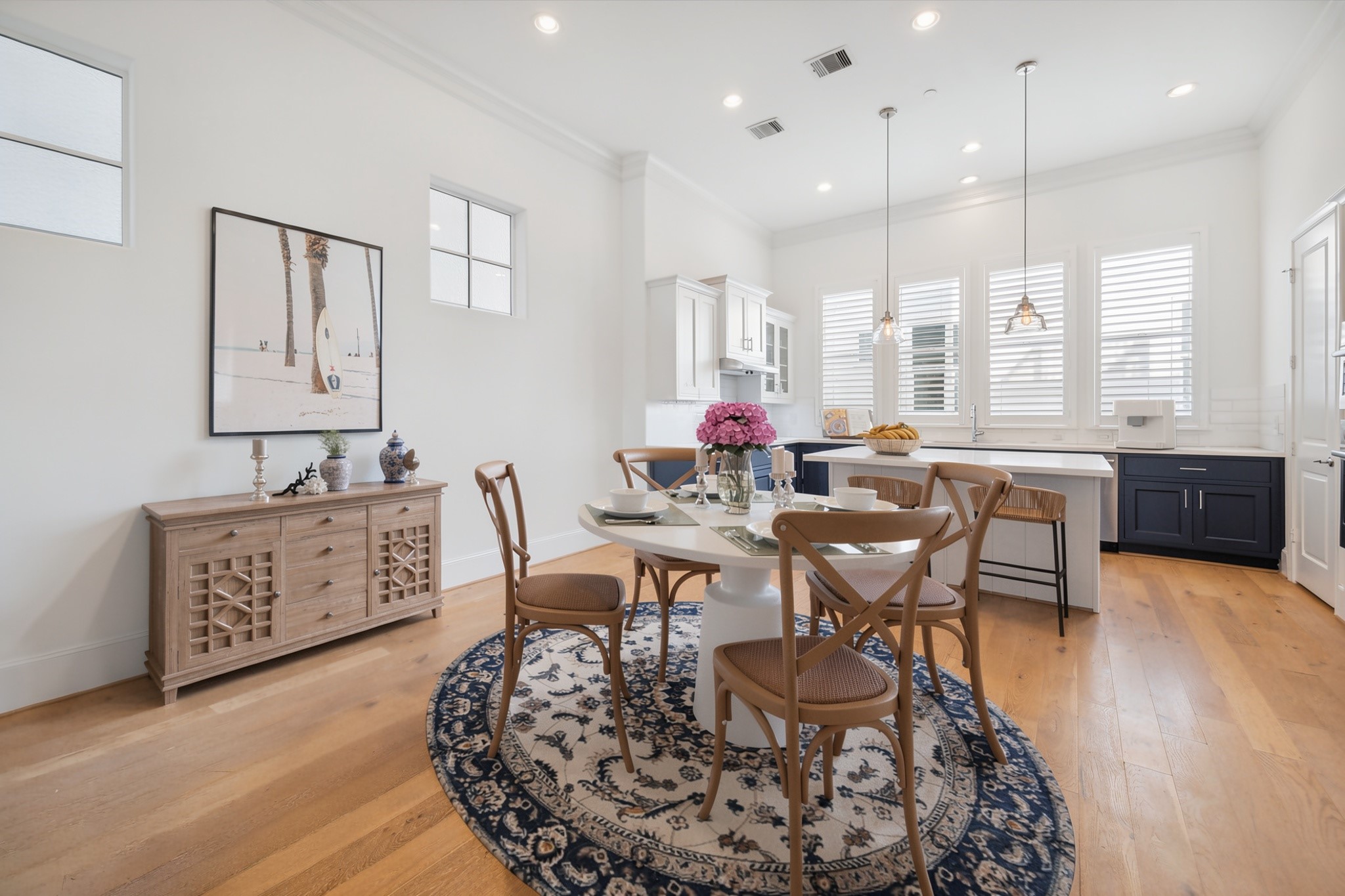 2714 Harvard Street Houston, TX 77008 - Photo 13 of 33 Plan your next dinner party in the centrally located dining area, surrounded by the kitchen, living room and staircase.