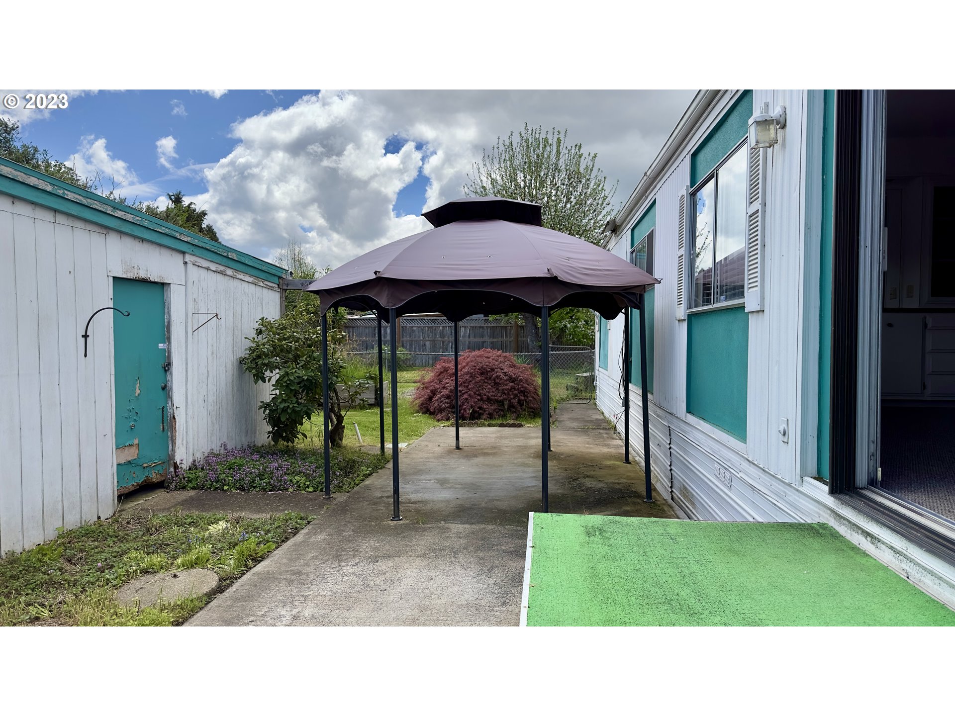 1695 Harbor Drive Springfield, OR 97477 - Photo 24 of 26 a black and white photo of a backyard