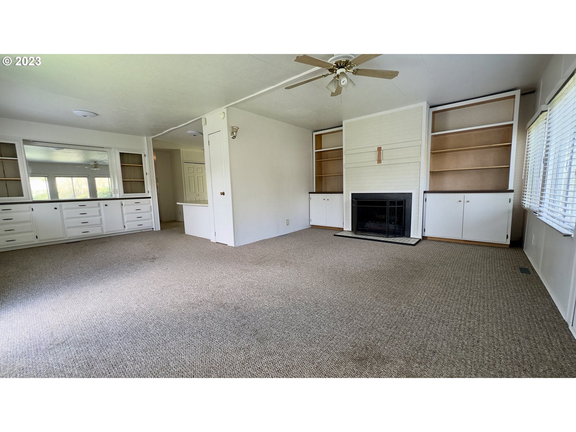 1695 Harbor Drive Springfield, OR 97477 - Photo 4 of 26 a living room with furniture and a flat screen tv