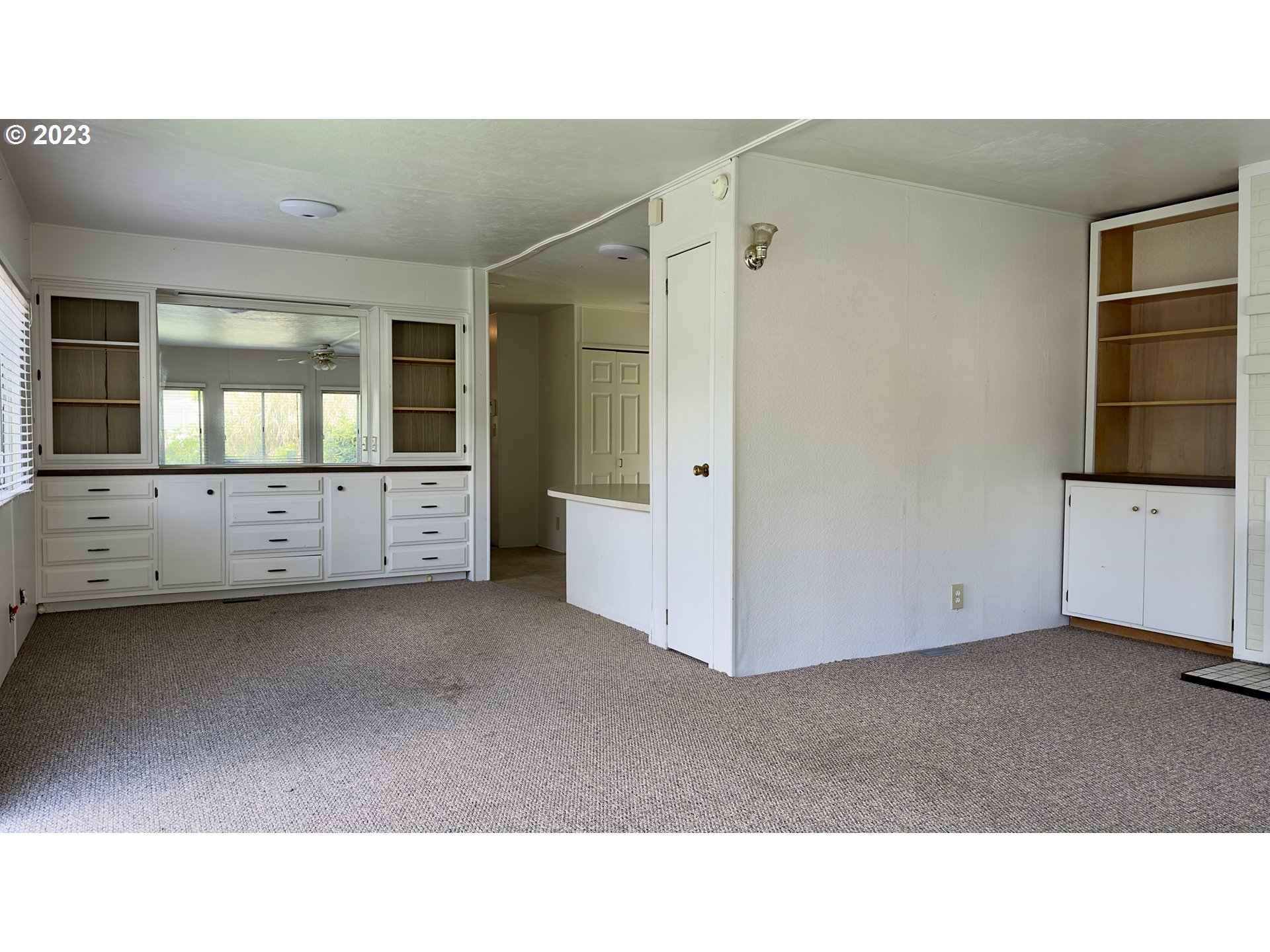 1695 Harbor Drive Springfield, OR 97477 - Photo 6 of 26 a kitchen with a refrigerator and window