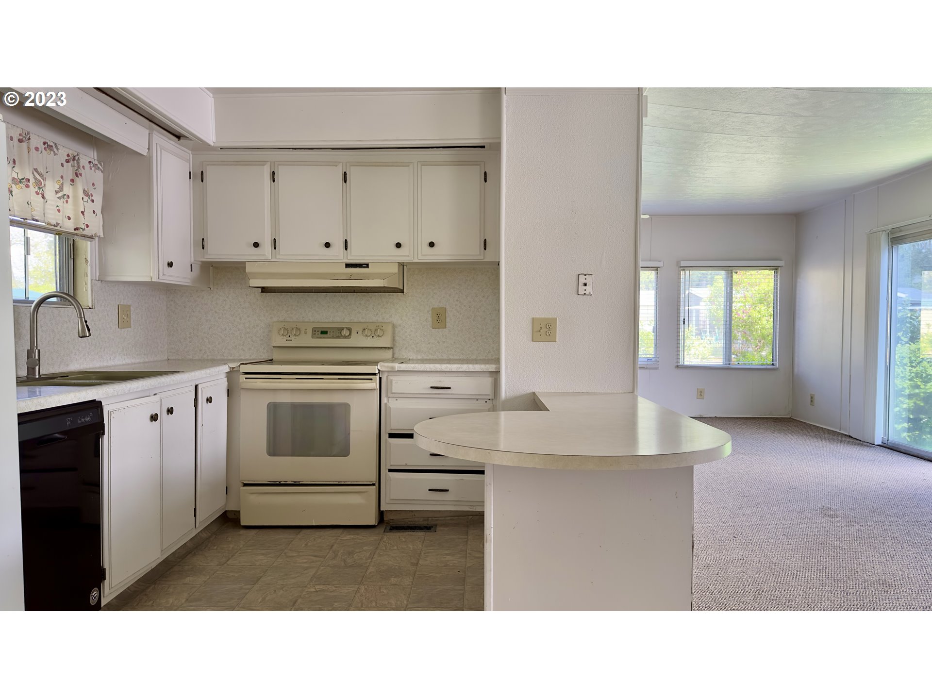 1695 Harbor Drive Springfield, OR 97477 - Photo 9 of 26 a kitchen with cabinets oven and a sink