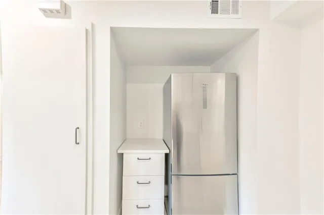 a close view of a refrigerator in kitchen