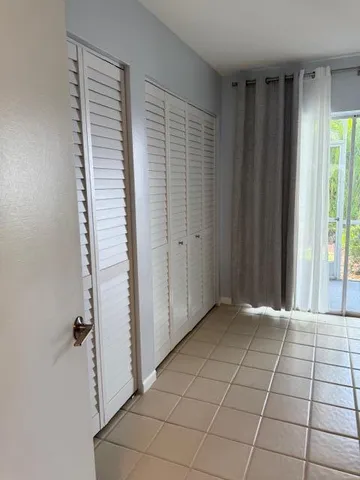 an empty room with window