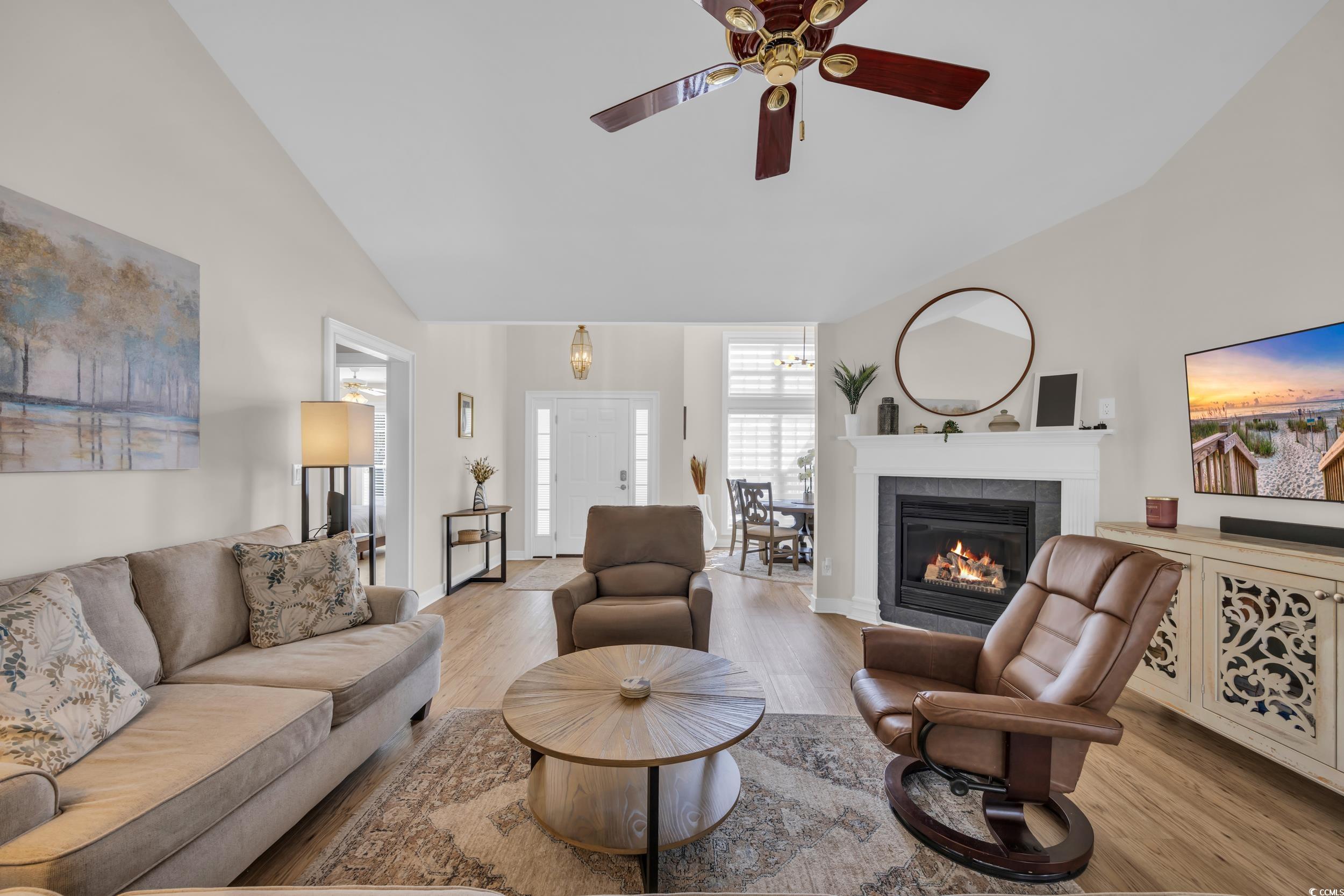 4208 Edgefield Road Little River, SC 29566 - Photo 14 of 33 Living room featuring vaulted ceiling, wood finish