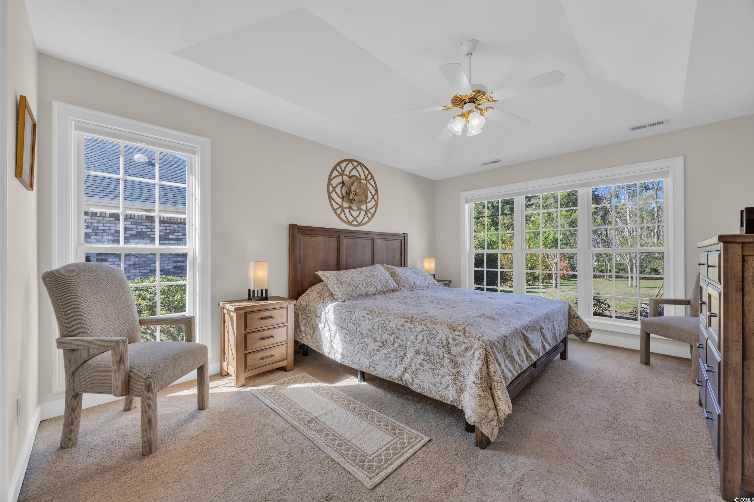 4208 Edgefield Road Little River, SC 29566 - Photo 18 of 33 Carpeted bedroom with a ceiling fan and visible ve