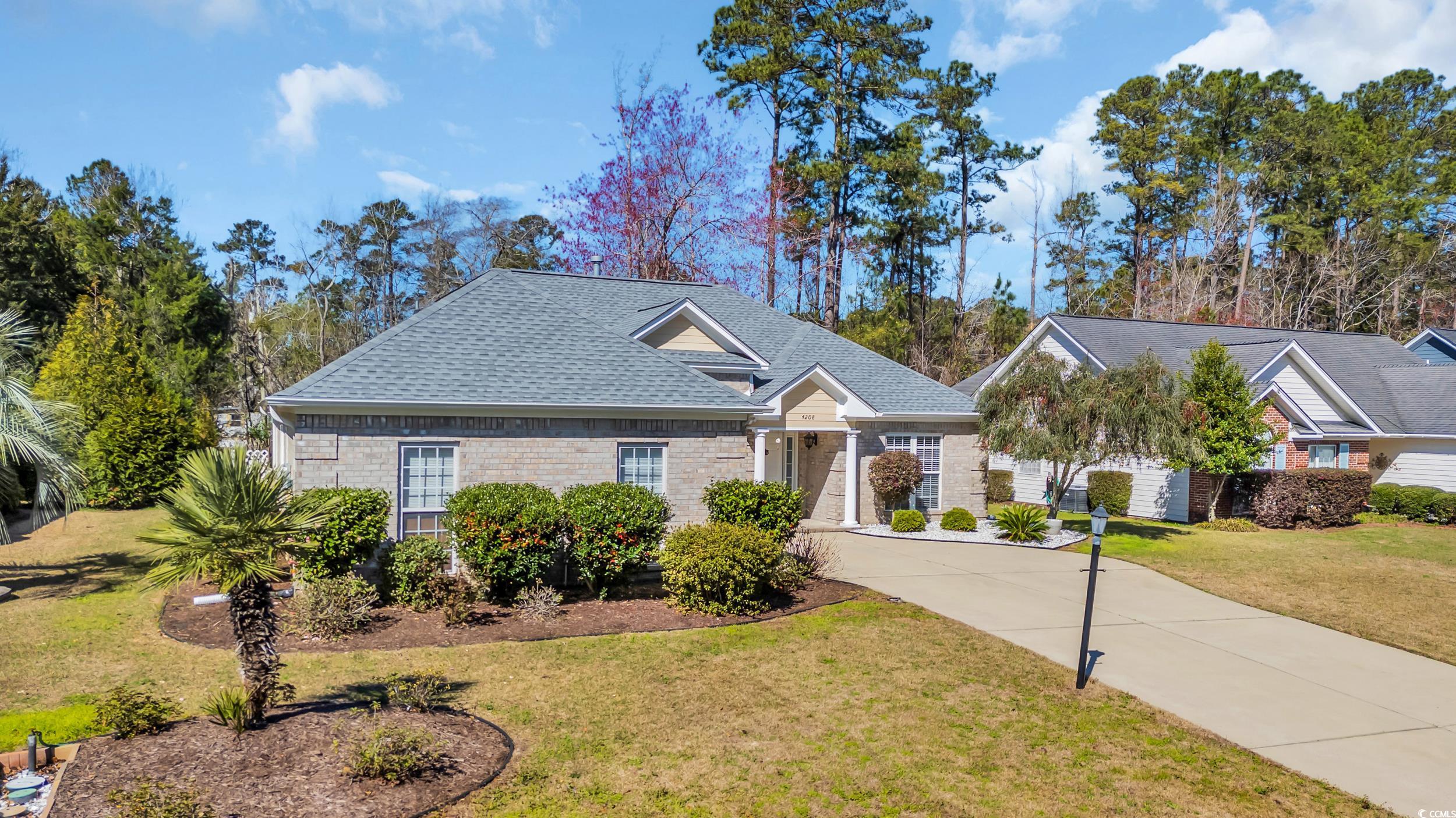 4208 Edgefield Road Little River, SC 29566 - Photo 2 of 33 View of front of home with driveway, brick siding,