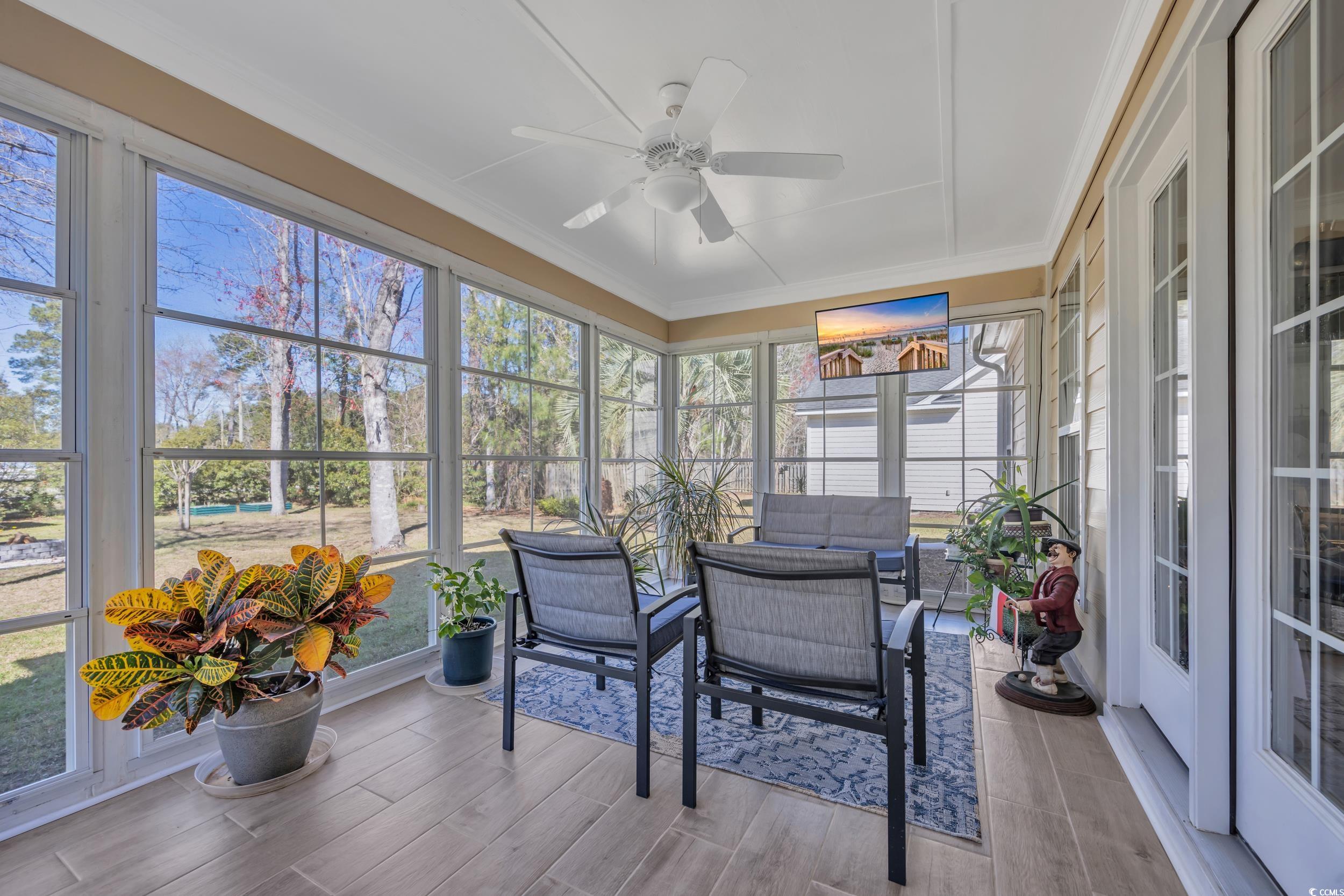 4208 Edgefield Road Little River, SC 29566 - Photo 23 of 33 Sunroom featuring an outdoor living space and ceil