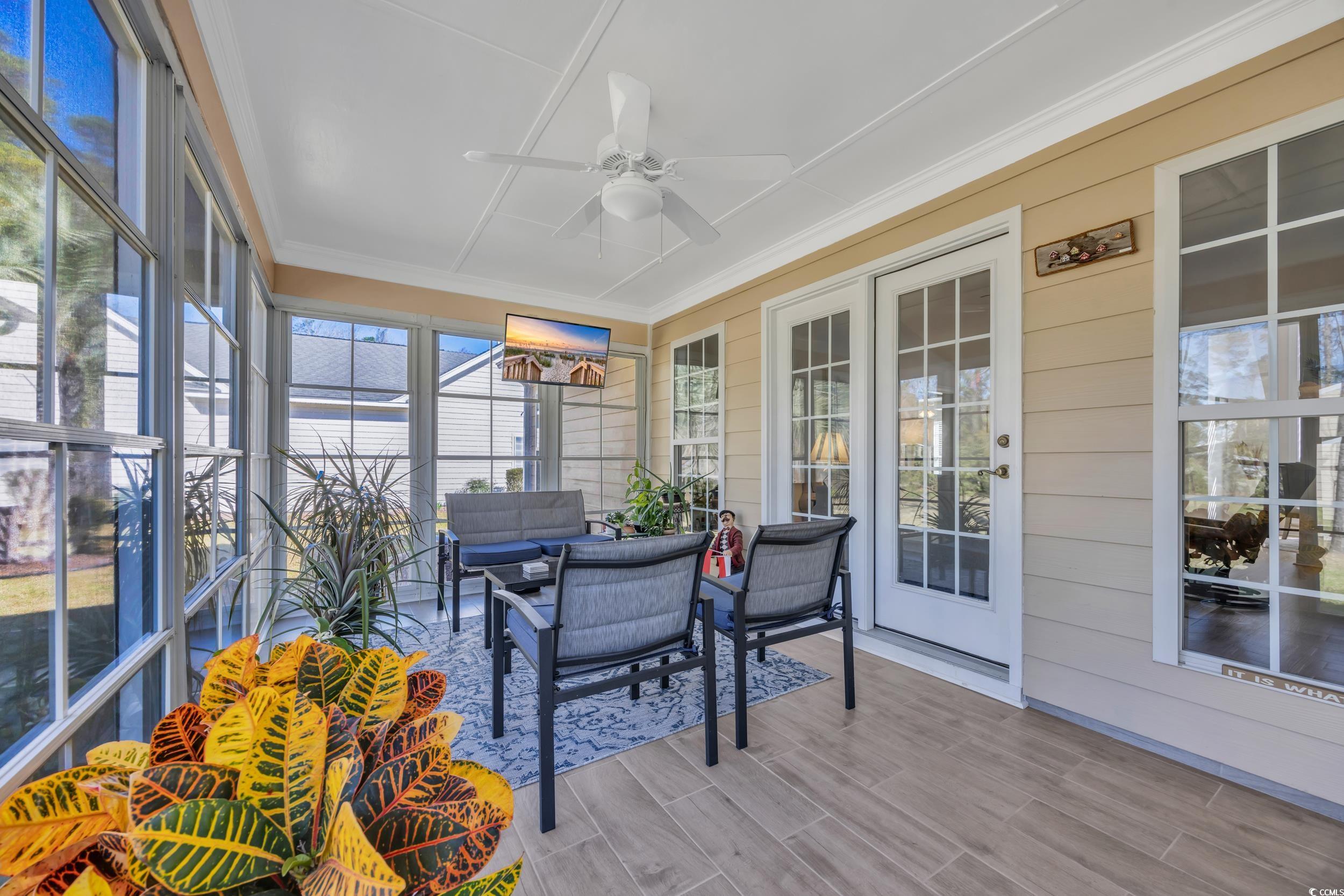 4208 Edgefield Road Little River, SC 29566 - Photo 24 of 33 Sunroom / solarium featuring ceiling fan and outdo