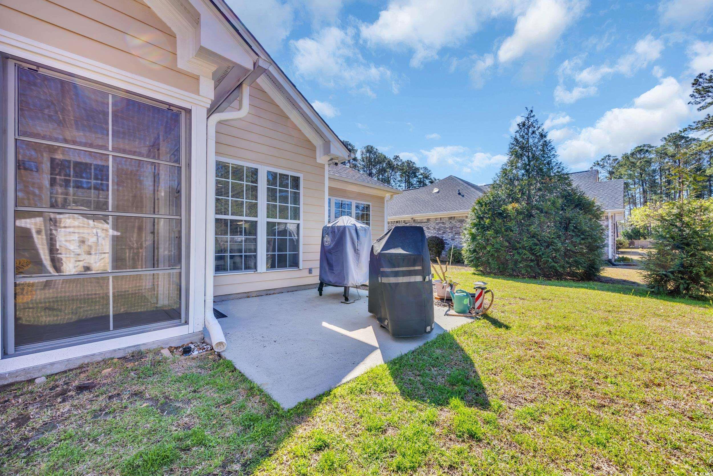4208 Edgefield Road Little River, SC 29566 - Photo 25 of 33 View of yard with a patio area