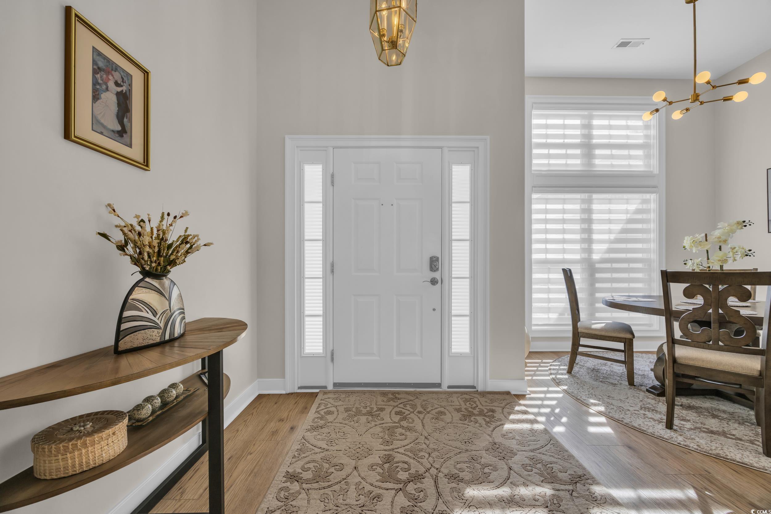 4208 Edgefield Road Little River, SC 29566 - Photo 6 of 33 Foyer entrance with baseboards, visible vents, lig