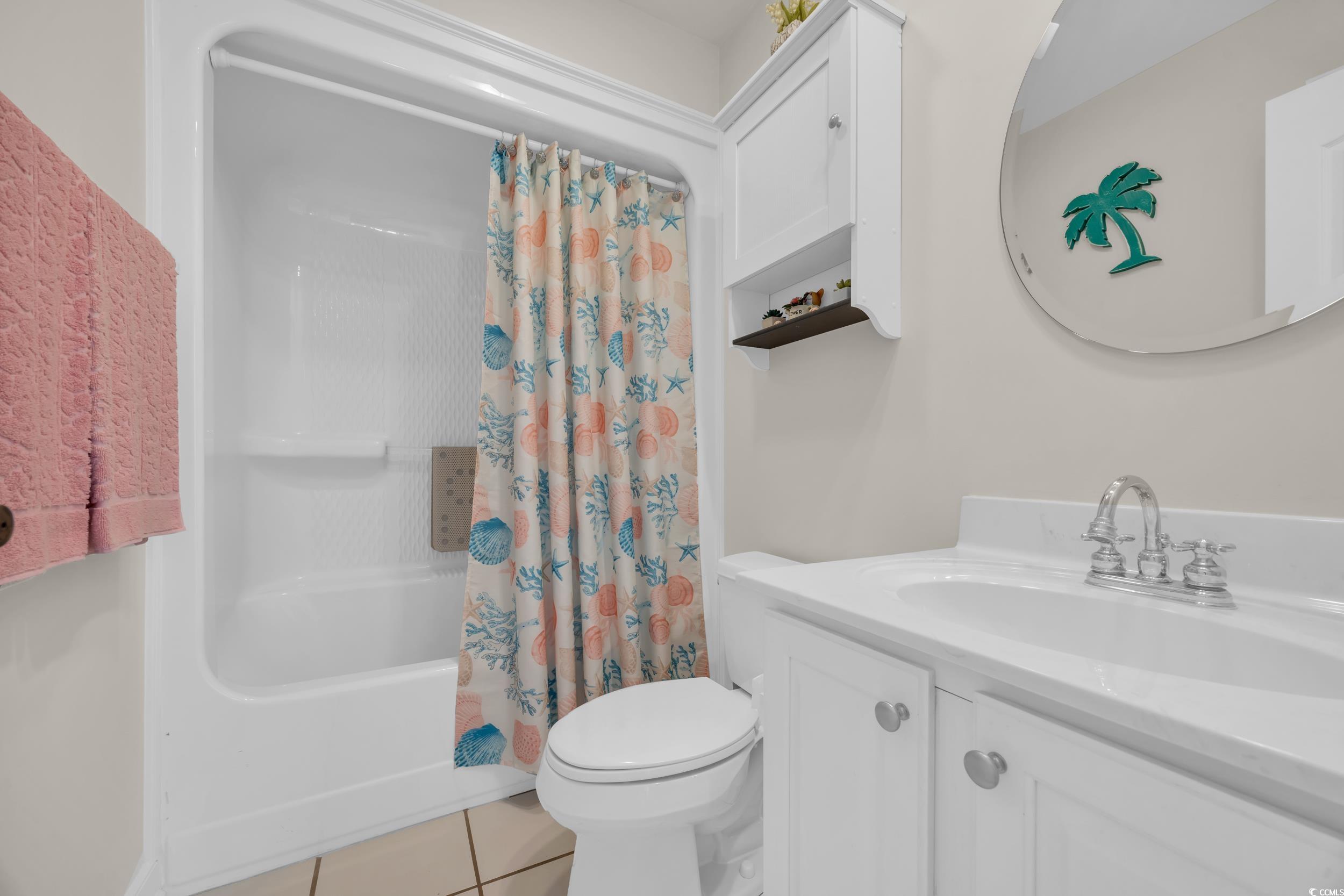 4208 Edgefield Road Little River, SC 29566 - Photo 10 of 33 Full bath with tile patterned floors, vanity, toil