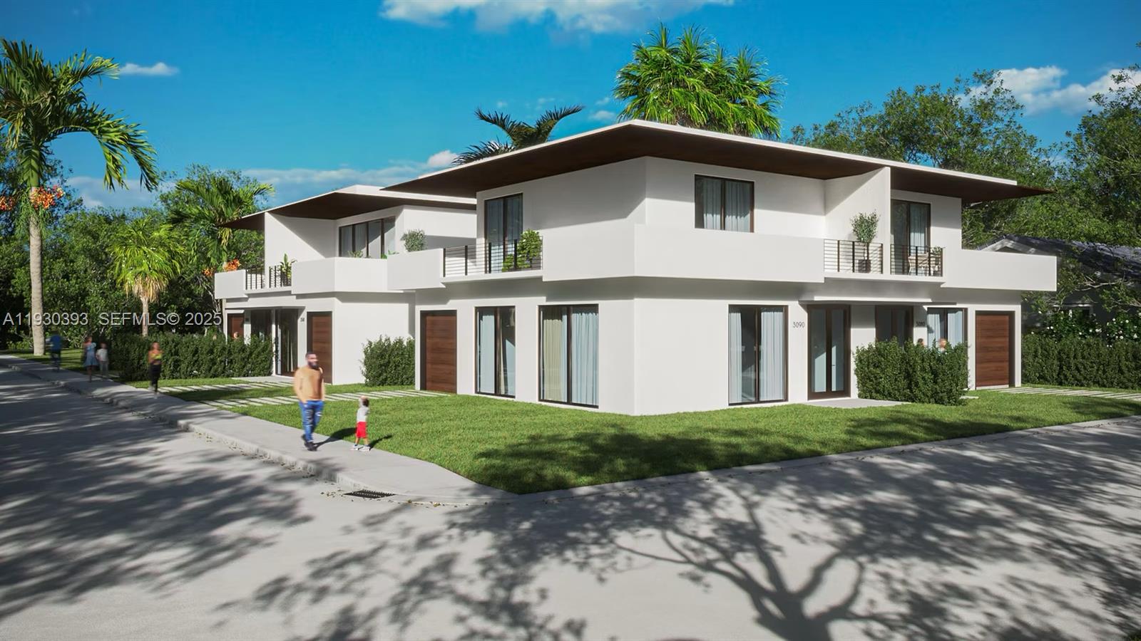 3090 Hibiscus Street Miami, FL 33133 - Photo 3 of 8 a front view of a house with a yard and trees