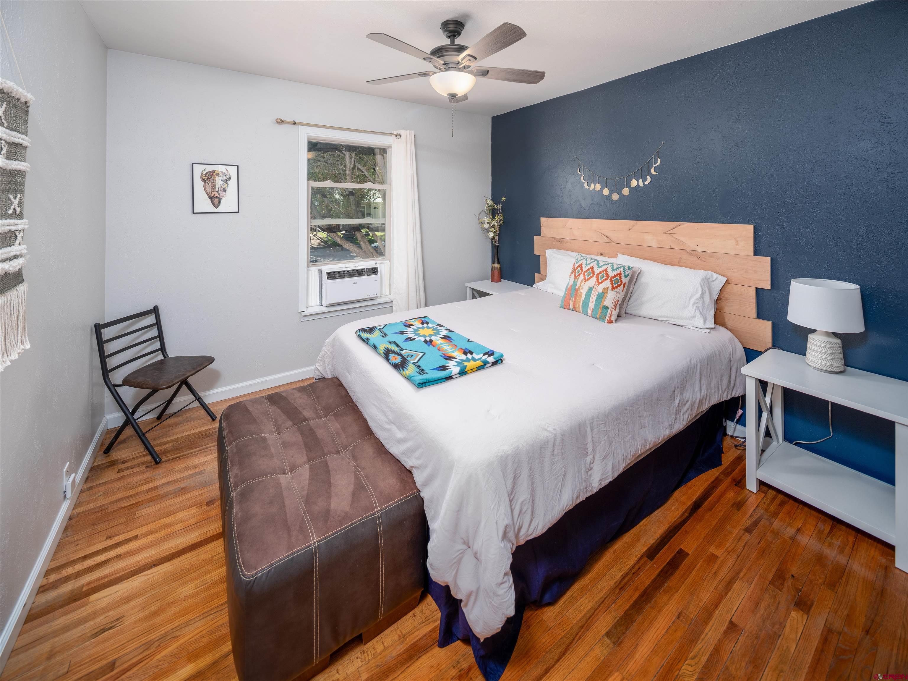 505 South Valley Road Cortez, CO 81321 - Photo 15 of 27 a bedroom with bed and a window