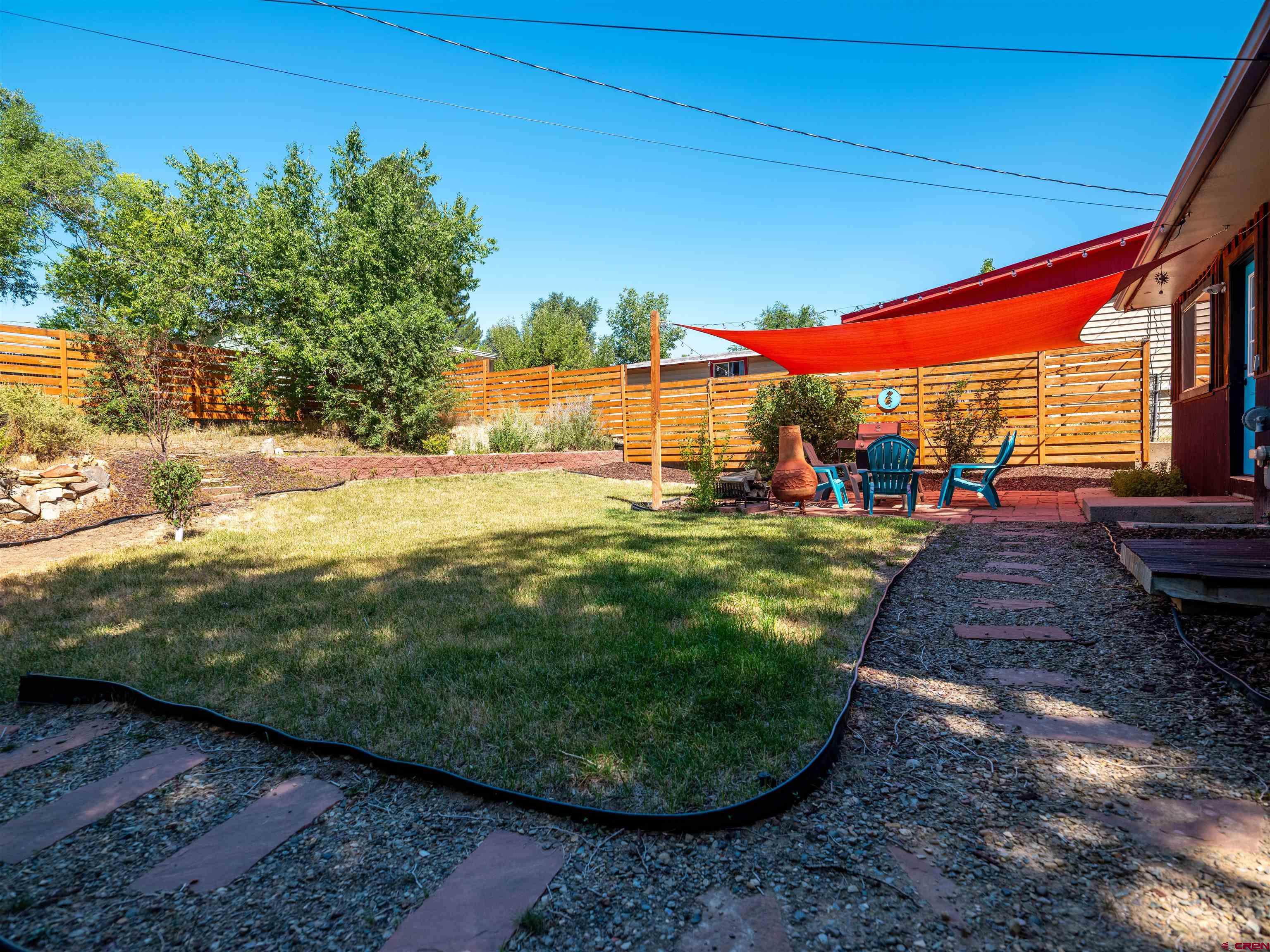 505 South Valley Road Cortez, CO 81321 - Photo 20 of 27 a view of a backyard with swimming pool