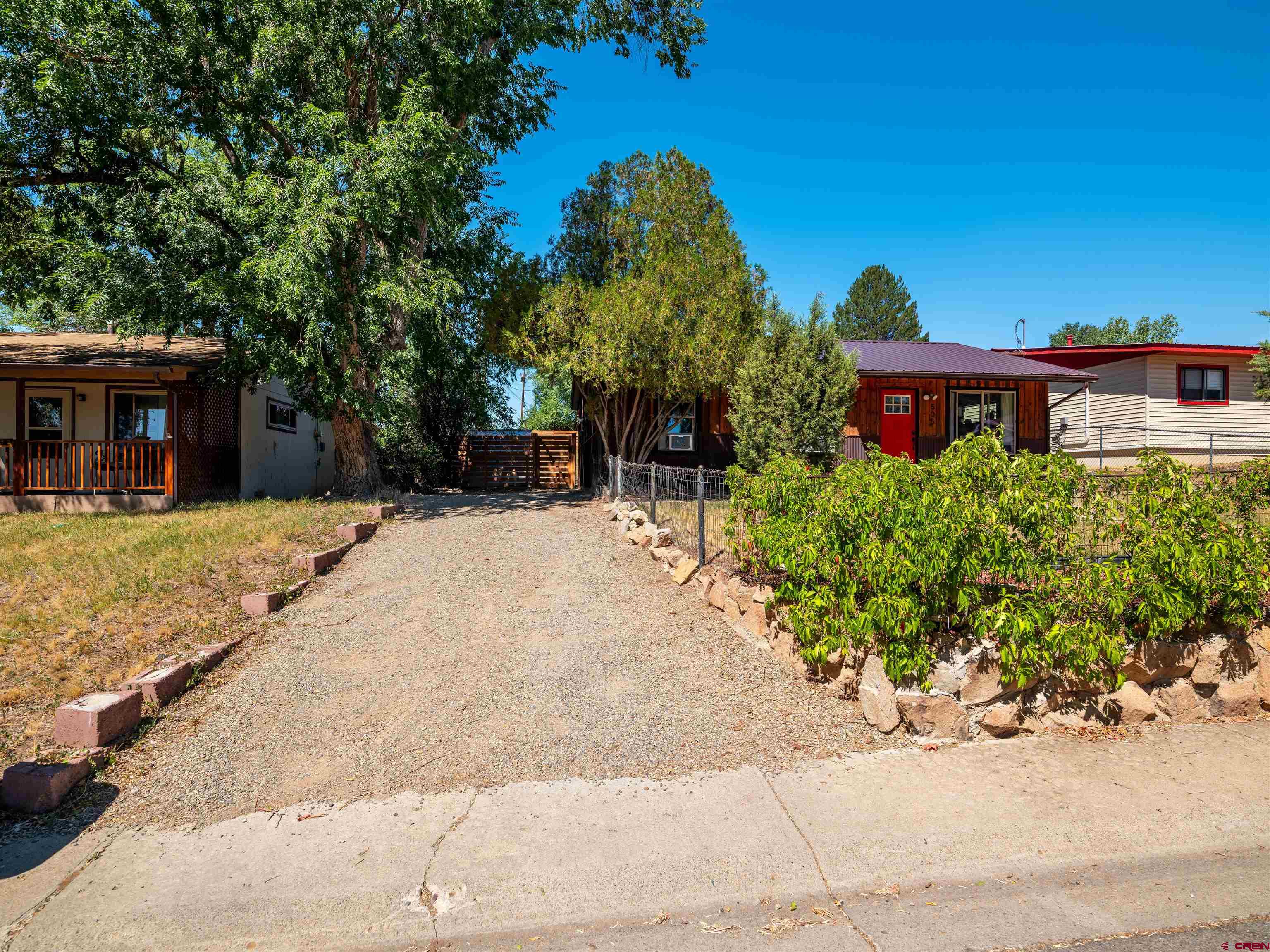 505 South Valley Road Cortez, CO 81321 - Photo 25 of 27 a view of a house with a yard