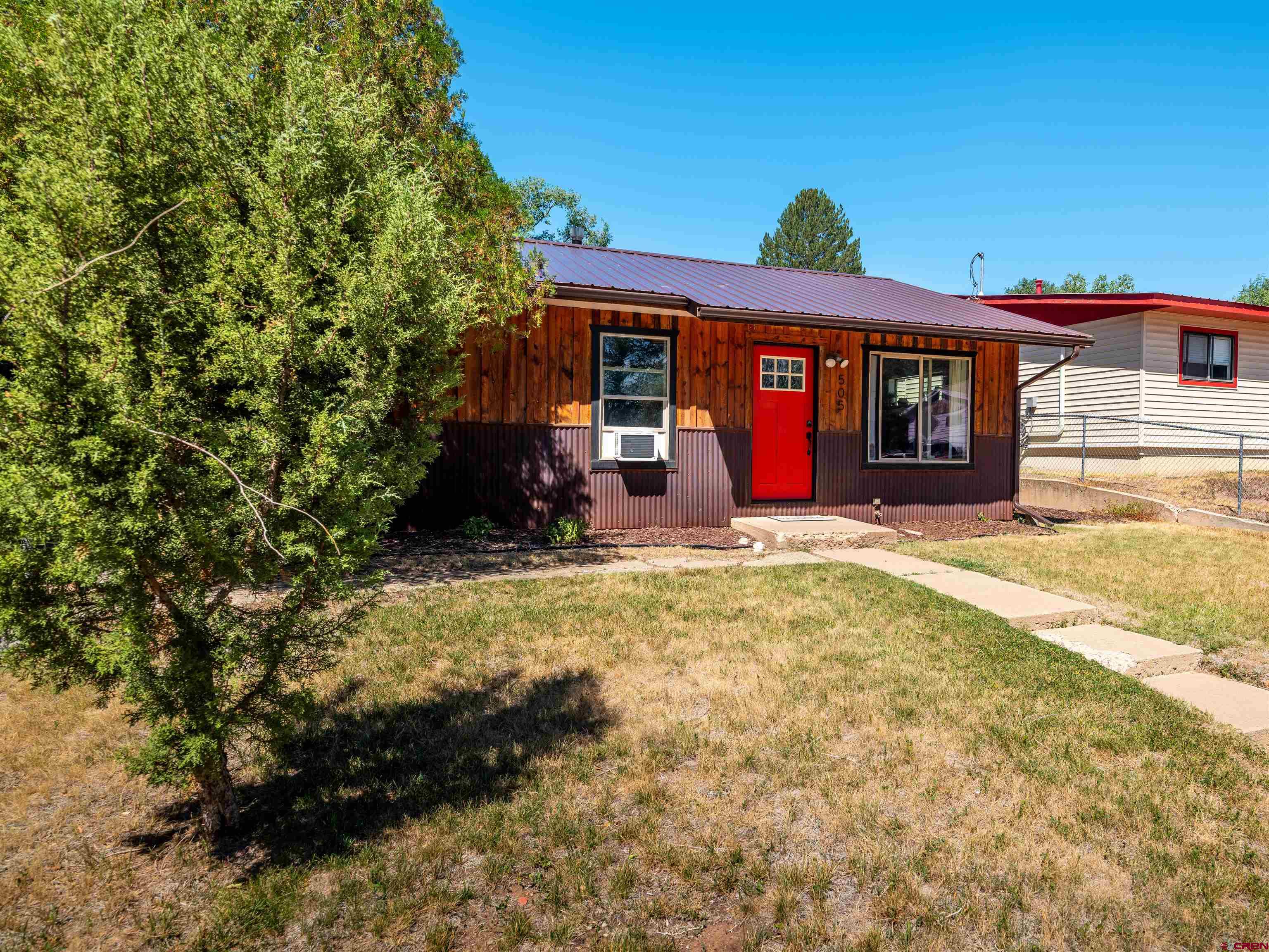 505 South Valley Road Cortez, CO 81321 - Photo 27 of 27 a view of a house with a yard