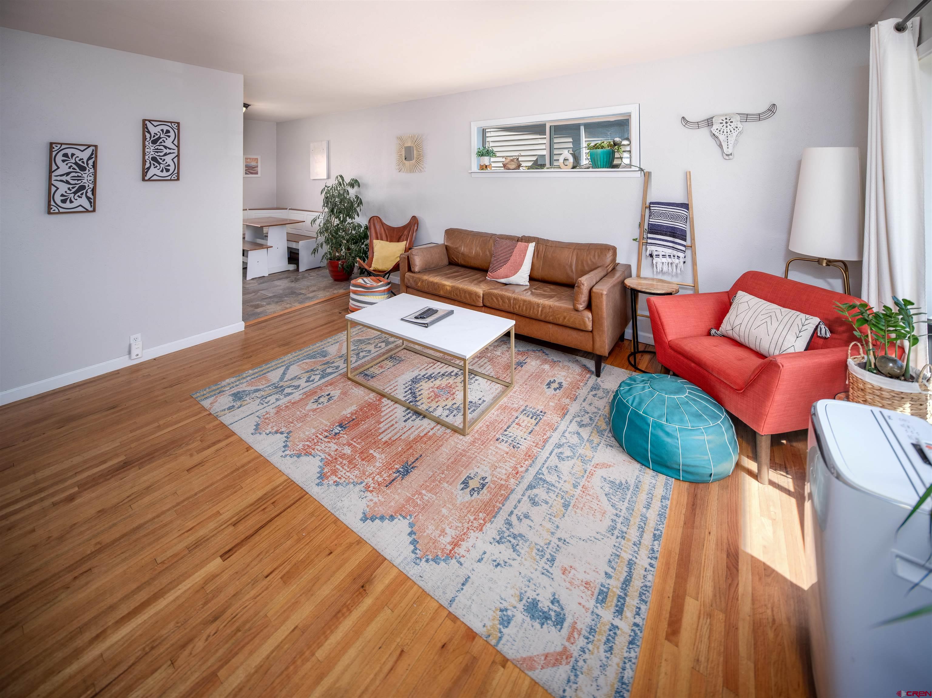 505 South Valley Road Cortez, CO 81321 - Photo 5 of 27 a living room with furniture and a rug