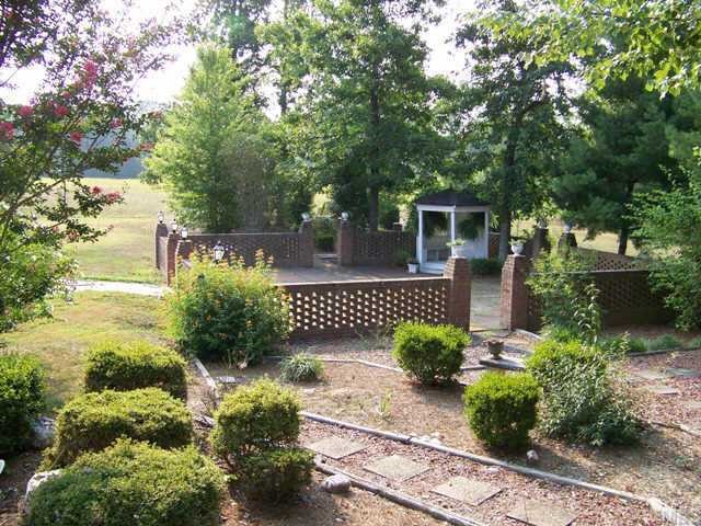 6416 Lebanon Road Mebane, NC 27302 - Photo 2 of 12 Gazebo area with brick enclosure and gorgeous landscaping