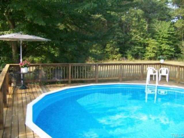 6416 Lebanon Road Mebane, NC 27302 - Photo 3 of 12 Above ground pool with extensive decking