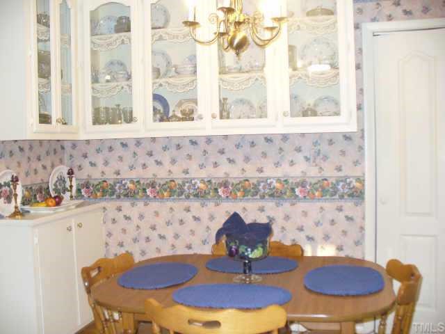 6416 Lebanon Road Mebane, NC 27302 - Photo 6 of 12 Breakfast area w/glass front cabinets