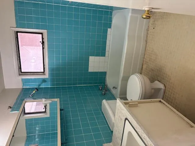 a view of a small space with windows