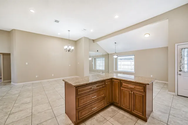 a bathroom with a sink a vanity and a mirror