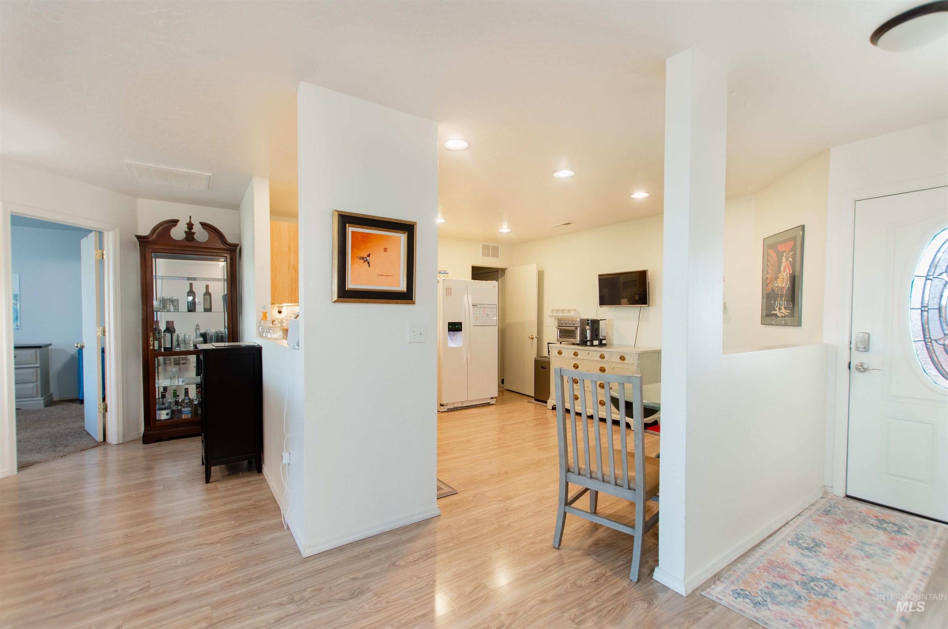 16711 Abram Avenue Caldwell, ID 83607 - Photo 3 of 24 Foyer featuring light wood finished floors and recessed lighting