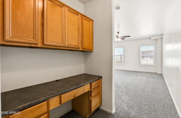 a view of cabinets and window