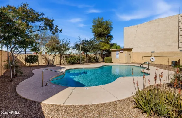 a view of a backyard with a patio