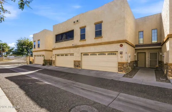 a view of a house with a street