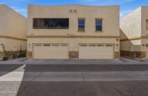 a view of a house with a street