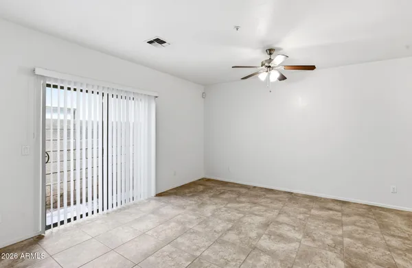 wooden floor in a hall with a window