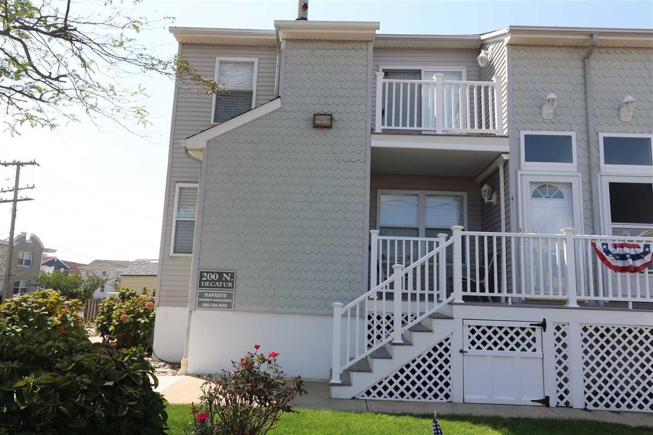 200 North Decatur Avenue, Unit 1 Margate City, NJ 08402 - Photo 2 of 12 a view of a house with wooden deck and furniture