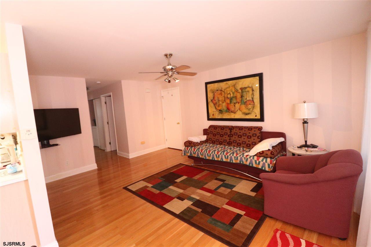 200 North Decatur Avenue, Unit 1 Margate City, NJ 08402 - Photo 5 of 12 a living room with furniture and a flat screen tv