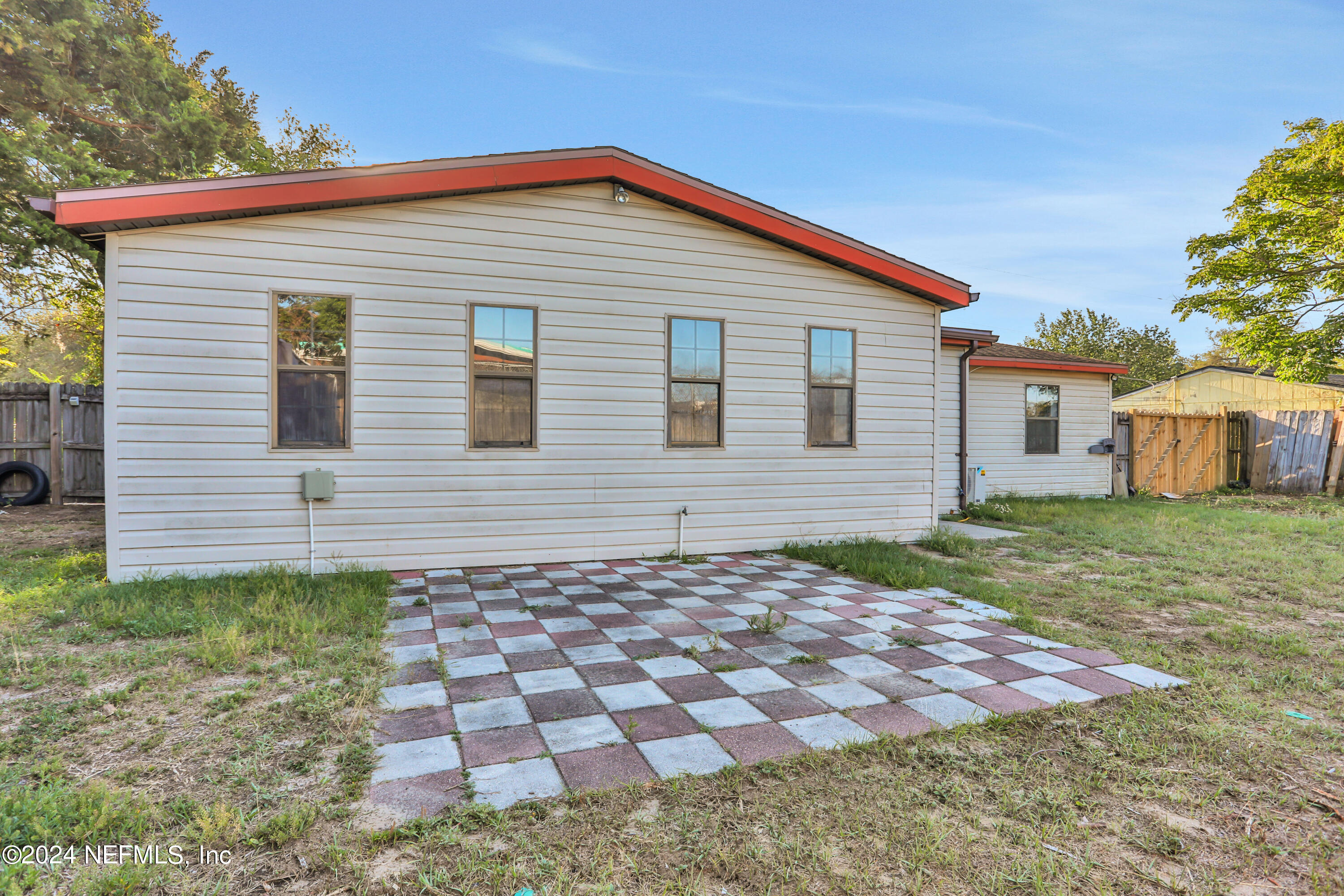 230 Cornell Road St. Augustine, FL 32086 - Photo 25 of 32 a view of a house with a yard