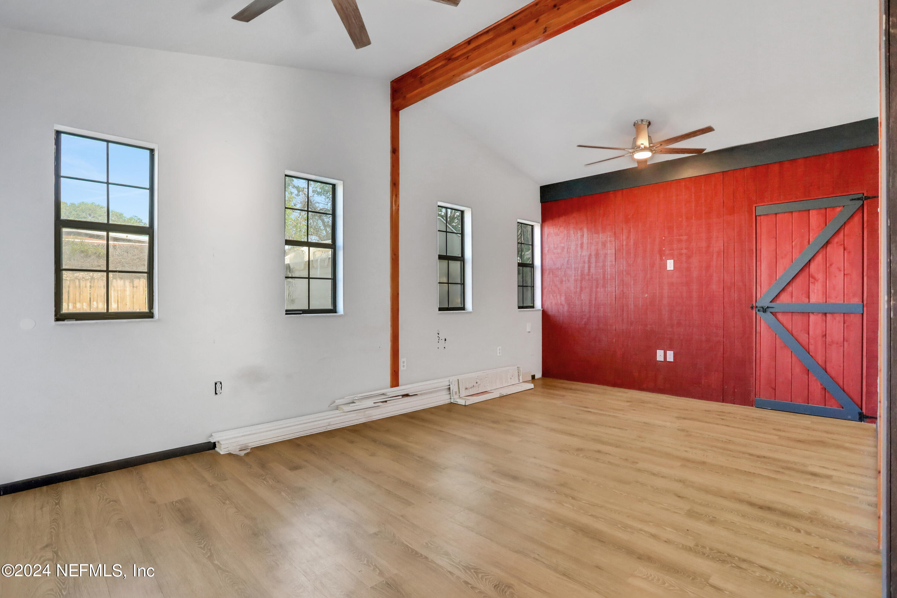 230 Cornell Road St. Augustine, FL 32086 - Photo 9 of 32 an empty room with windows