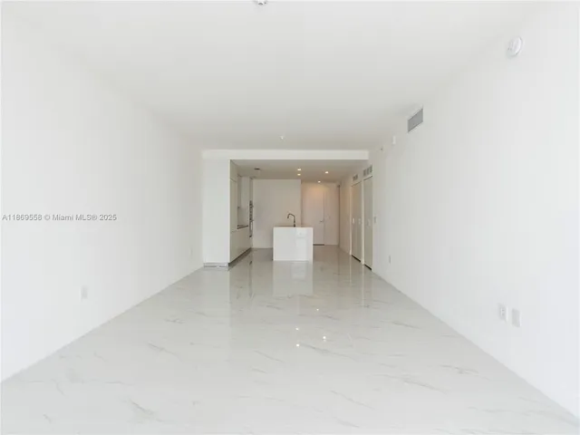 a view of a swimming pool with an outdoor seating