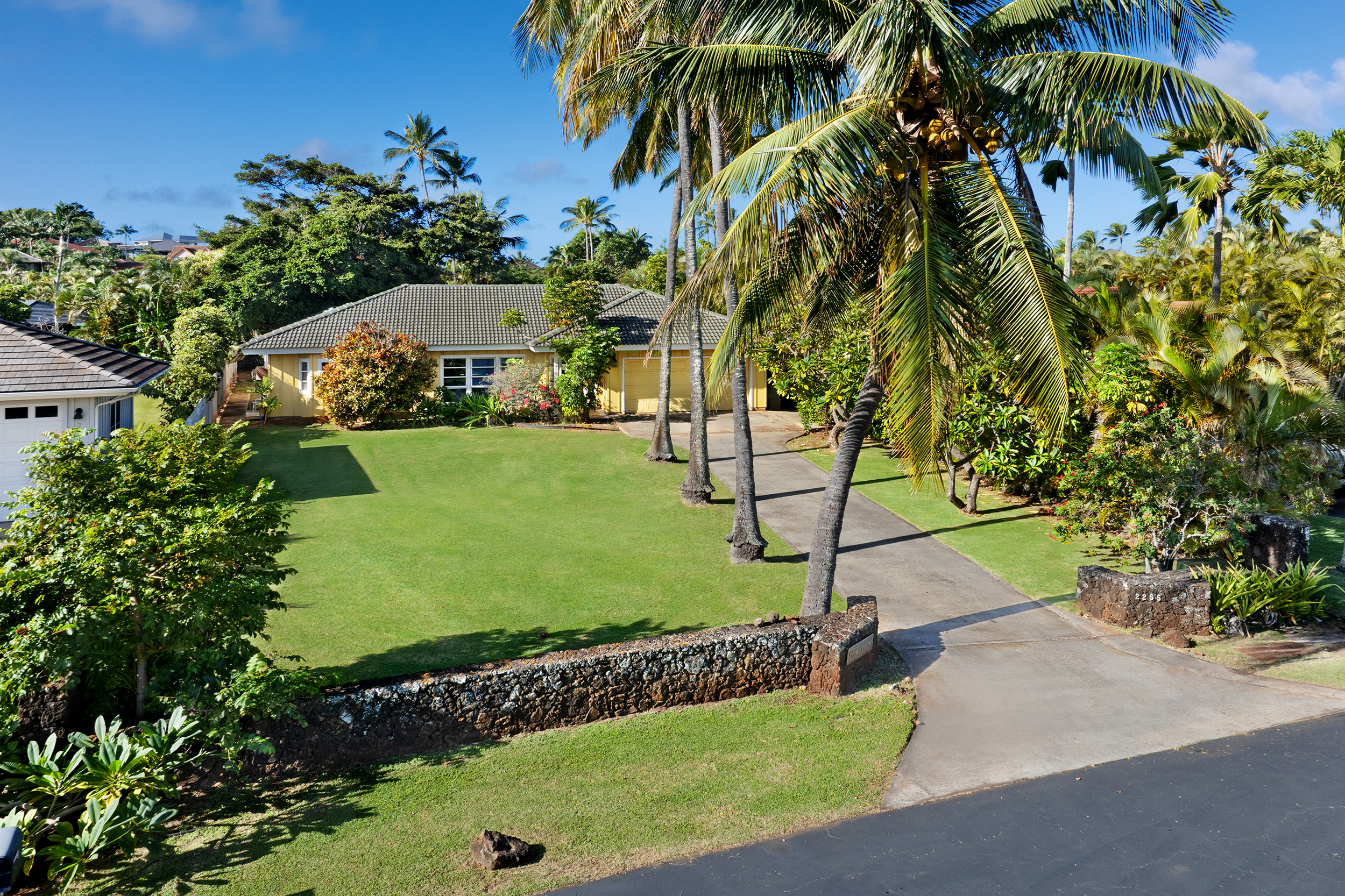 2255 Loke Road Koloa, HI 96756 - Photo 2 of 17 a view of a garden with a tree