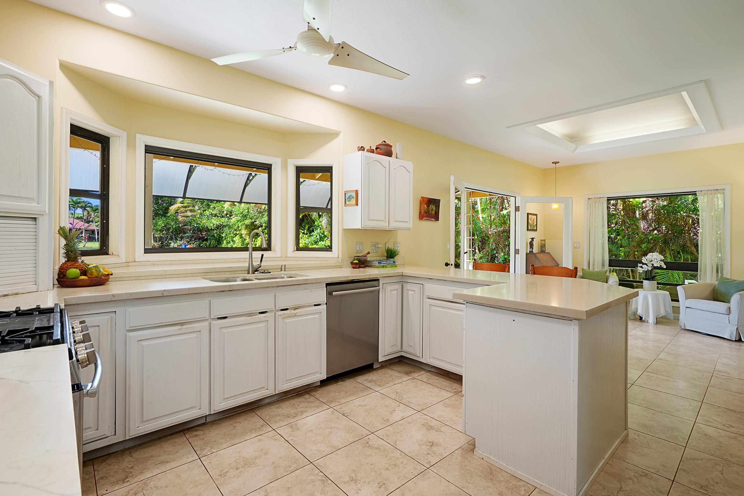 2255 Loke Road Koloa, HI 96756 - Photo 4 of 17 a kitchen with a sink and cabinets