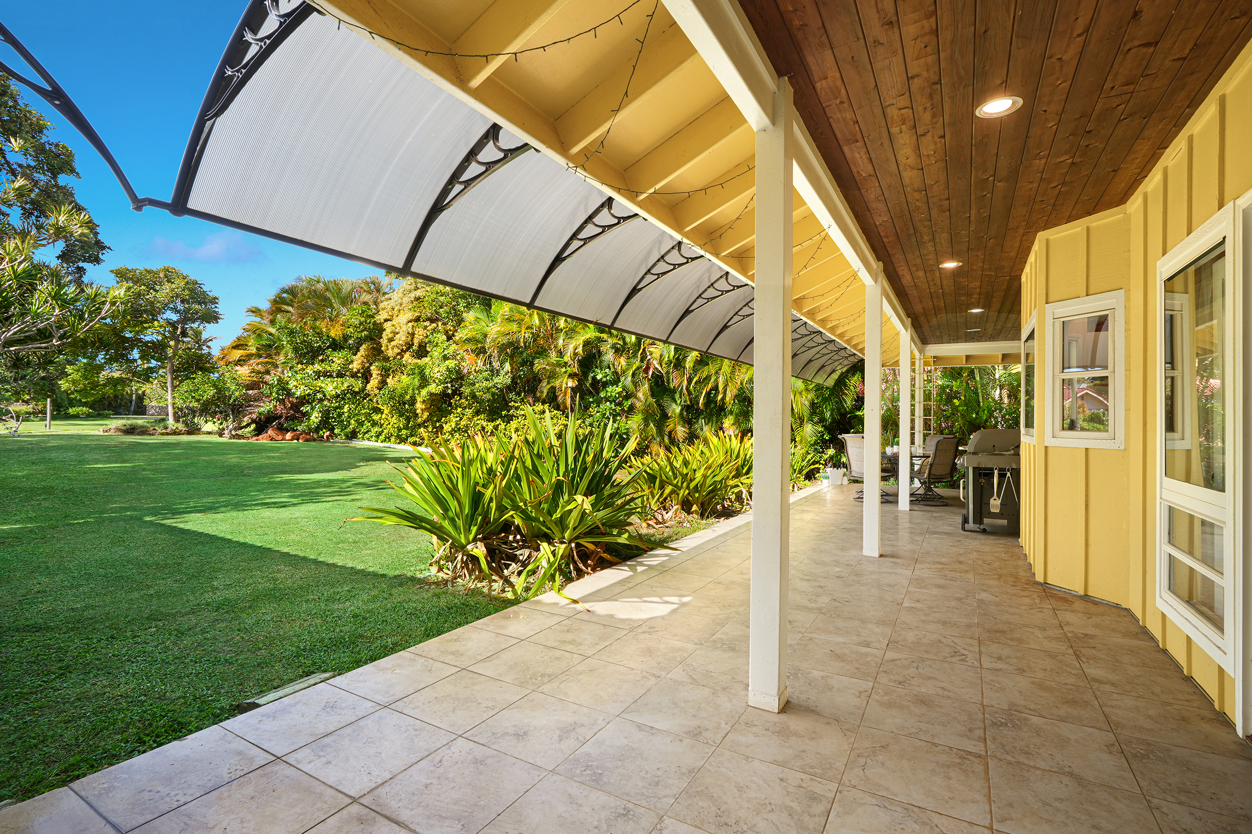 2255 Loke Road Koloa, HI 96756 - Photo 6 of 17 a view of a pathway along with potted plants