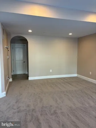 a view of an empty room and a windows